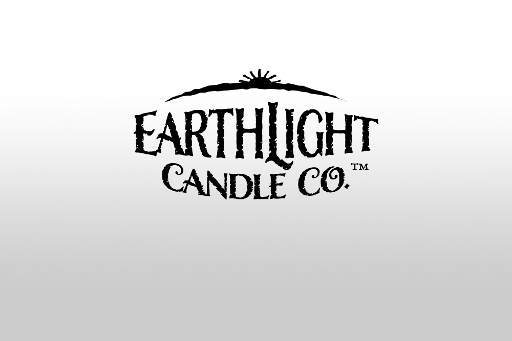Island Breeze, Eastern Horizons, and Mountain Valley candle packaging